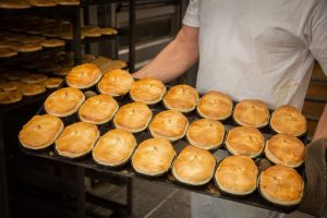 tray of meat pies fresh out of the oven